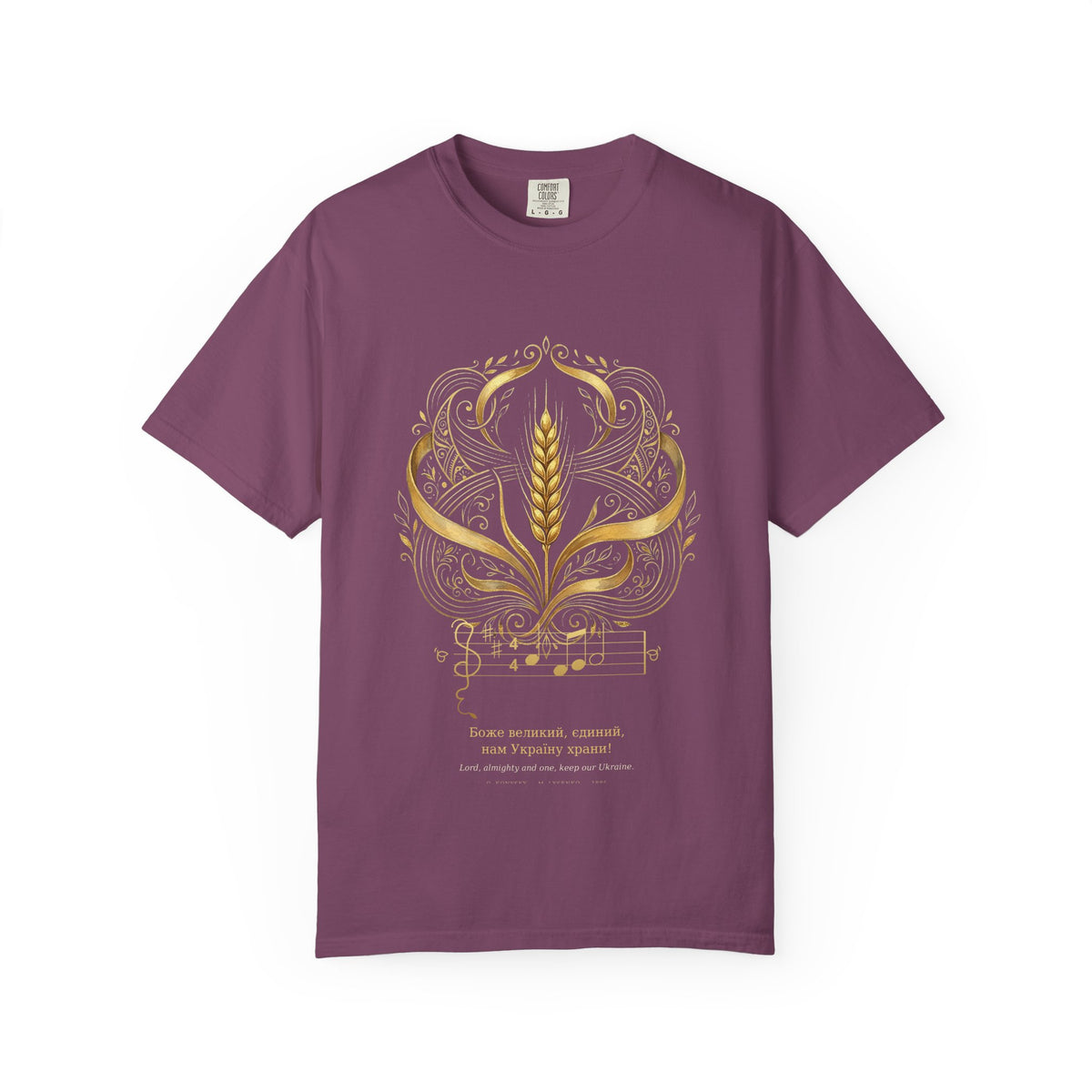Prayer for Ukraine tee by Palimpsest — a gold wheat sheaf and art-nouveau scrollwork with the opening bars, on a plum shirt