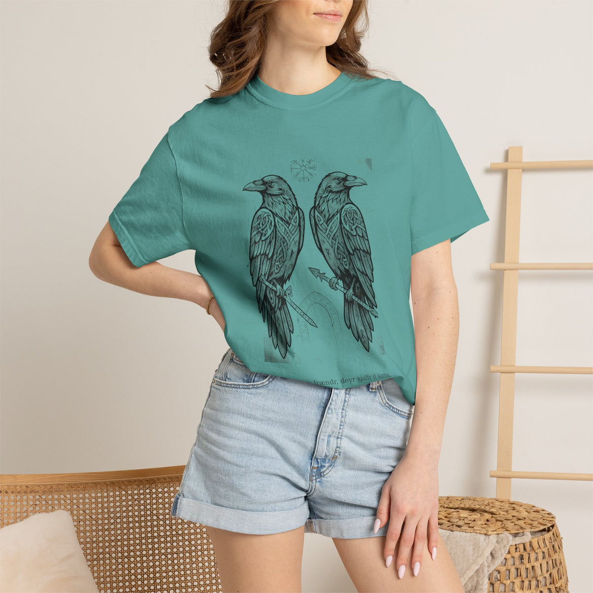 Model wearing the jade green Hávamál tee by Palimpsest