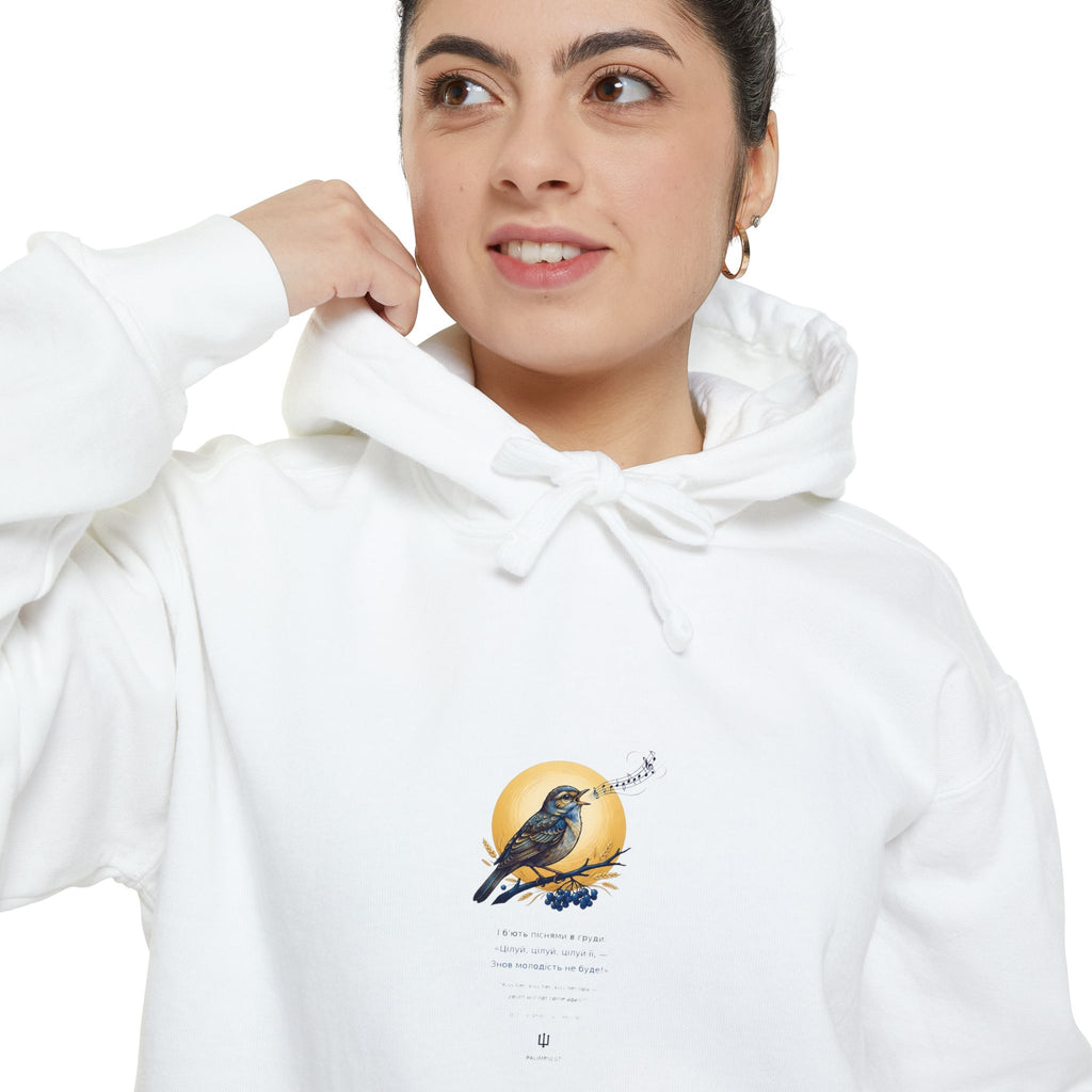 Close-up of the white Chary Nochi hoodie print by Palimpsest — a nightingale perched against a gold moon