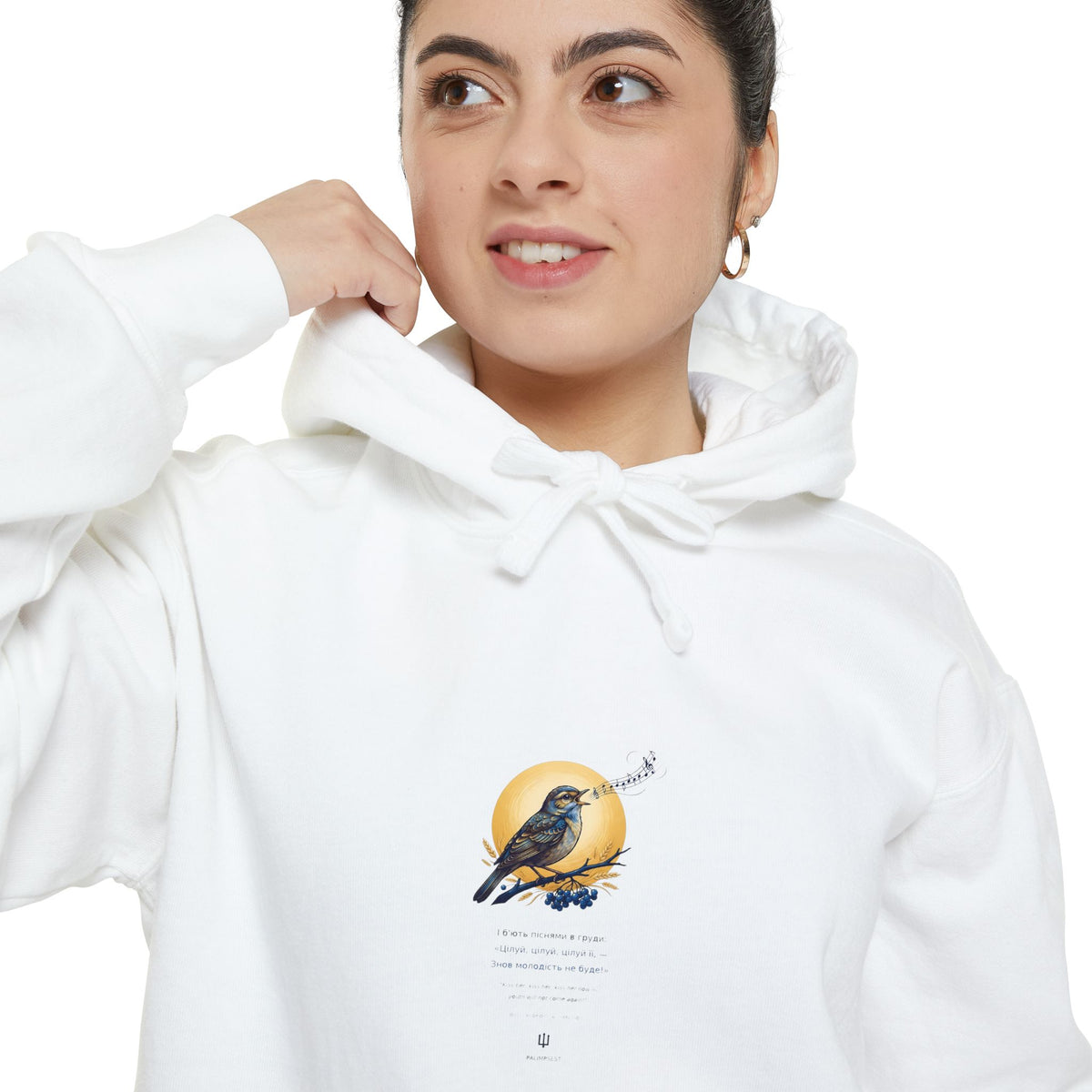 Close-up of the white Chary Nochi hoodie print by Palimpsest — a nightingale perched against a gold moon