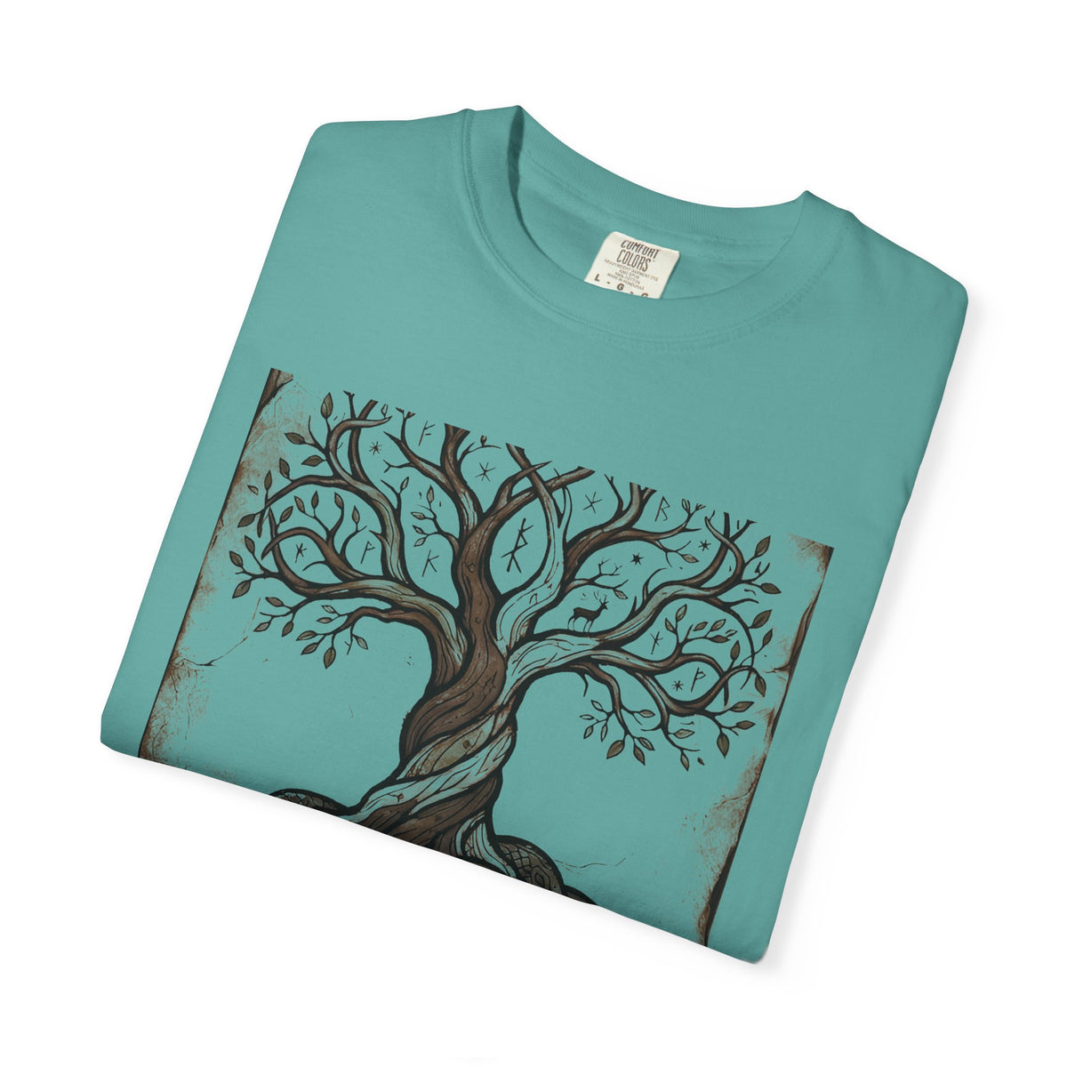 Folded jade green Völuspá tee showing the woodcut Yggdrasil print
