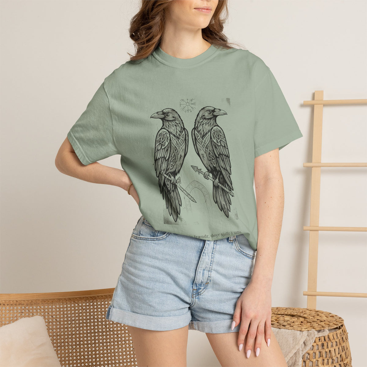 Model wearing the sage green Hávamál tee by Palimpsest