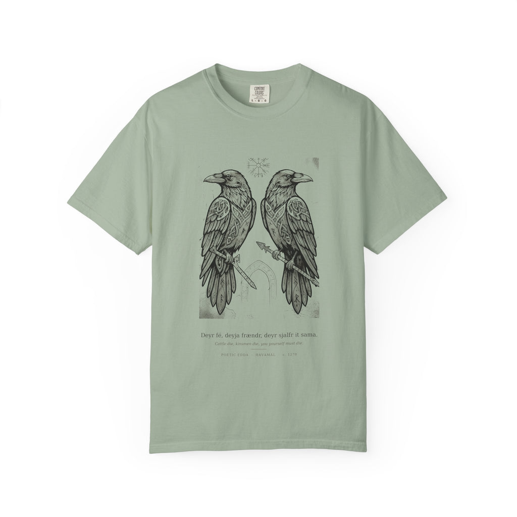 Hávamál tee by Palimpsest — two woodcut ravens above 'cattle die, kinsmen die' in Old Norse, on a sage green garment-dyed shirt
