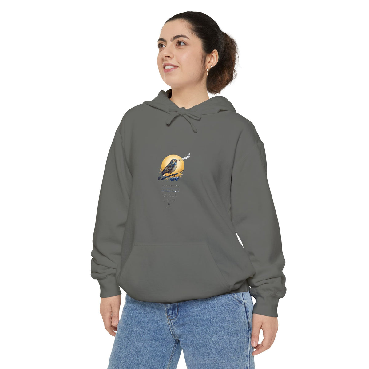 Woman wearing the charcoal grey Chary Nochi hoodie — a nightingale perched against a gold moon