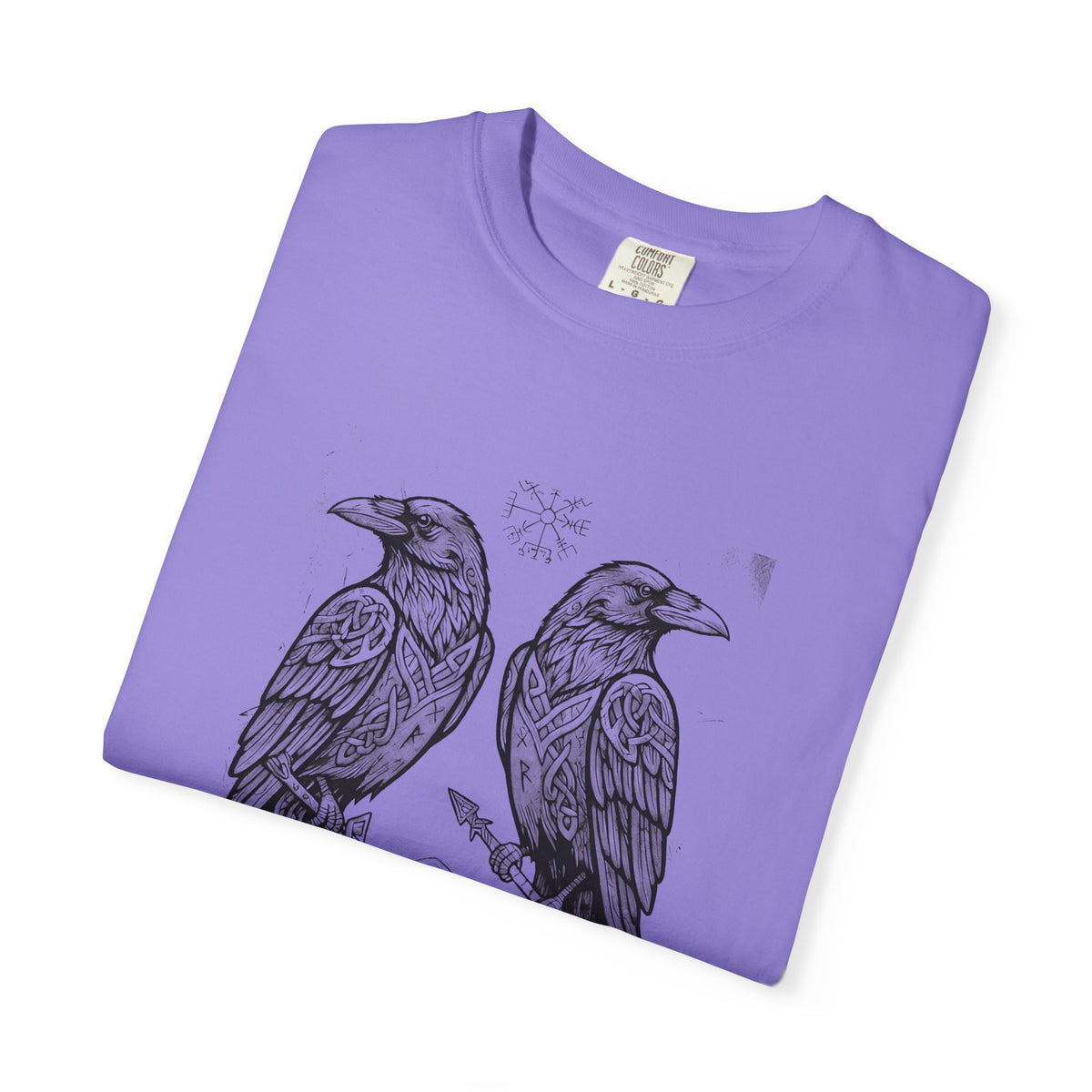 Folded violet Hávamál tee showing the woodcut raven print