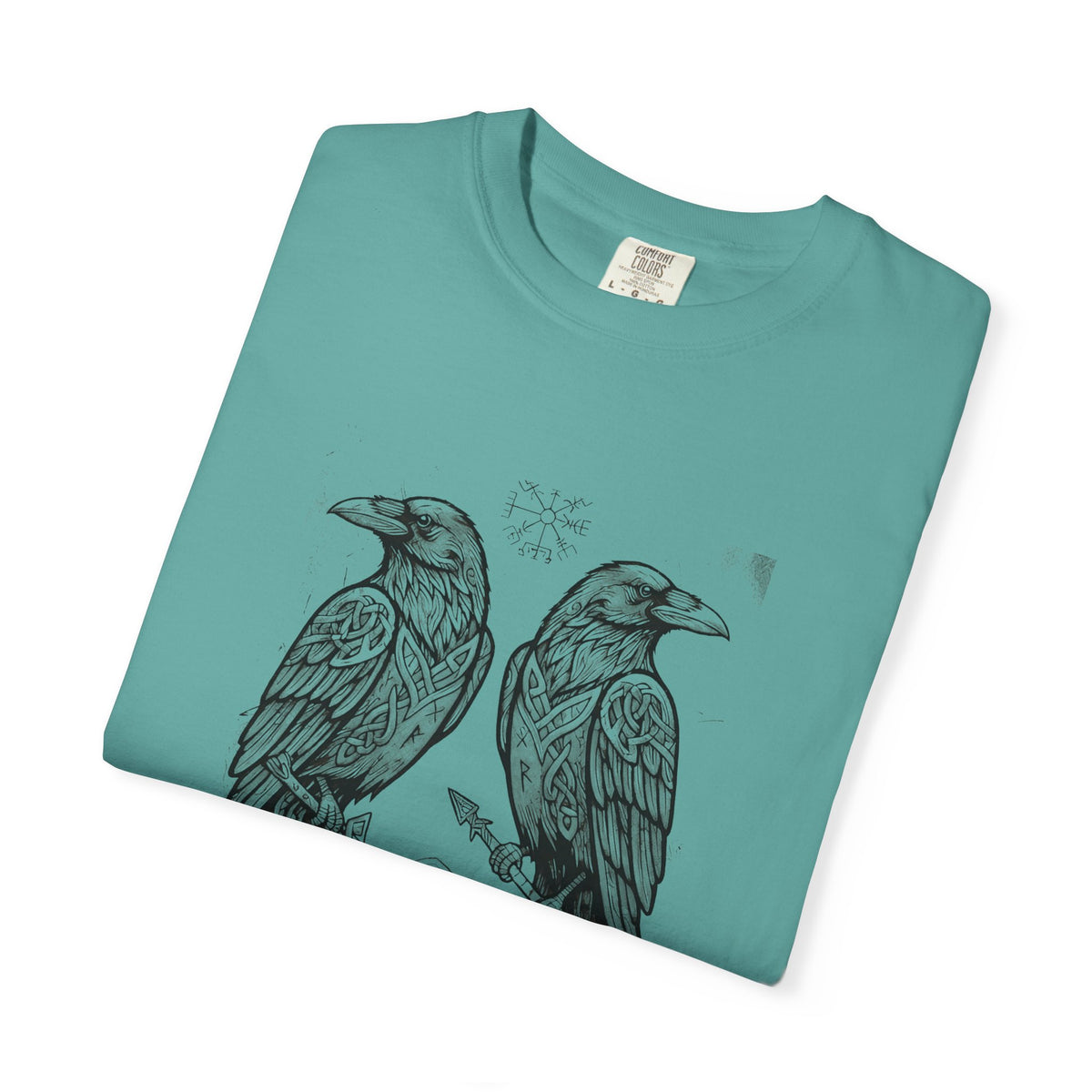 Folded jade green Hávamál tee showing the woodcut raven print