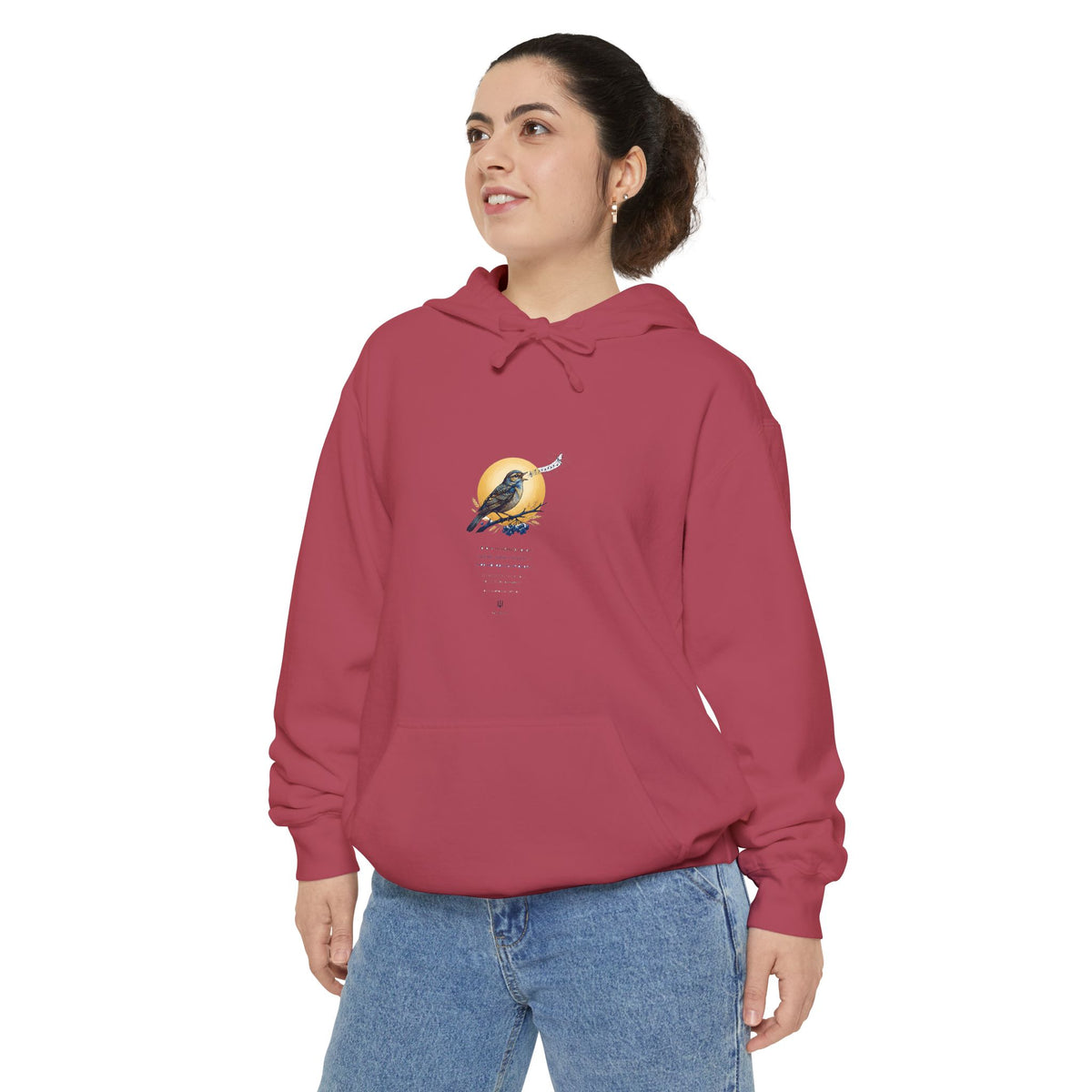 Woman wearing the cardinal red Chary Nochi hoodie — a nightingale perched against a gold moon