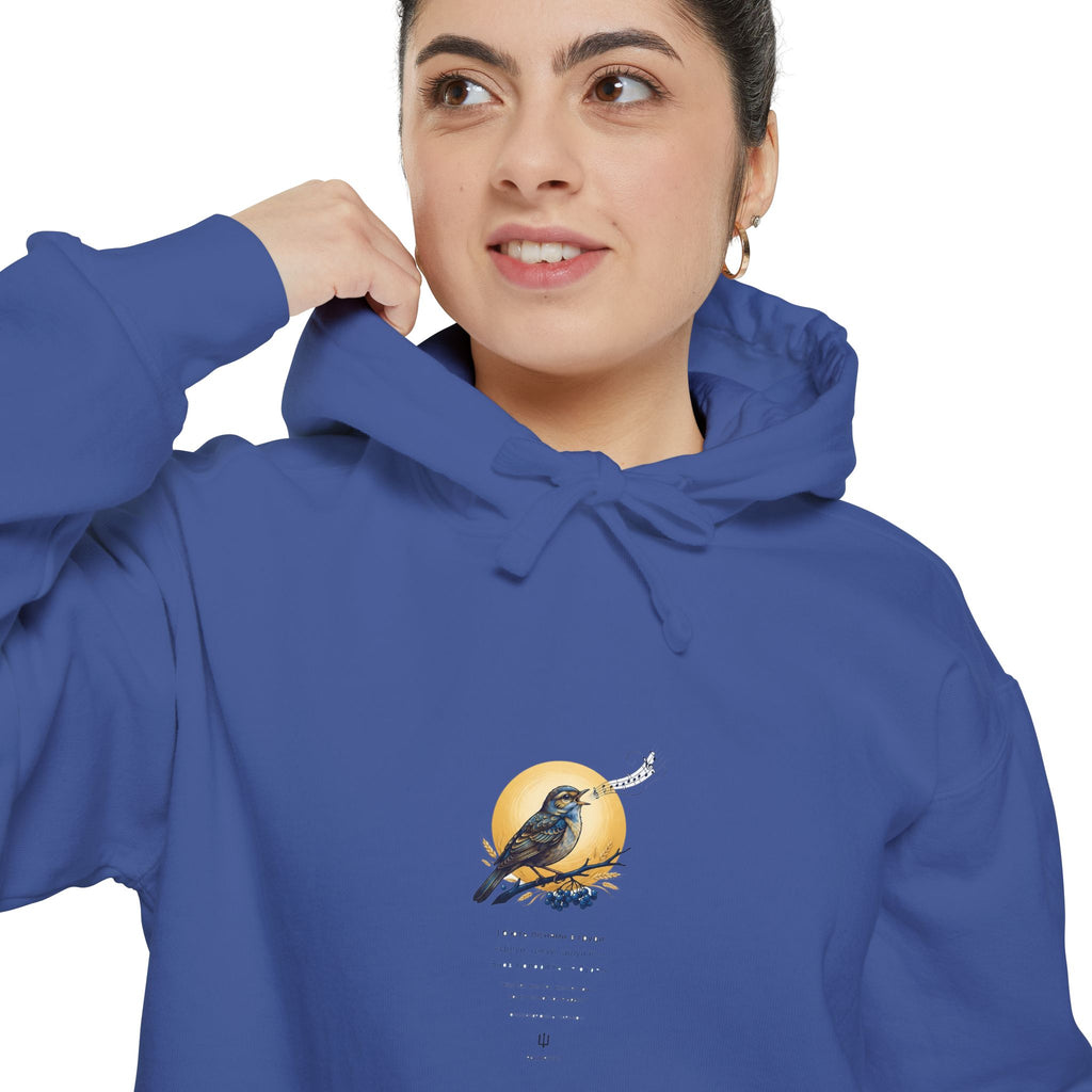 Close-up of the royal blue Chary Nochi hoodie print by Palimpsest — a nightingale perched against a gold moon