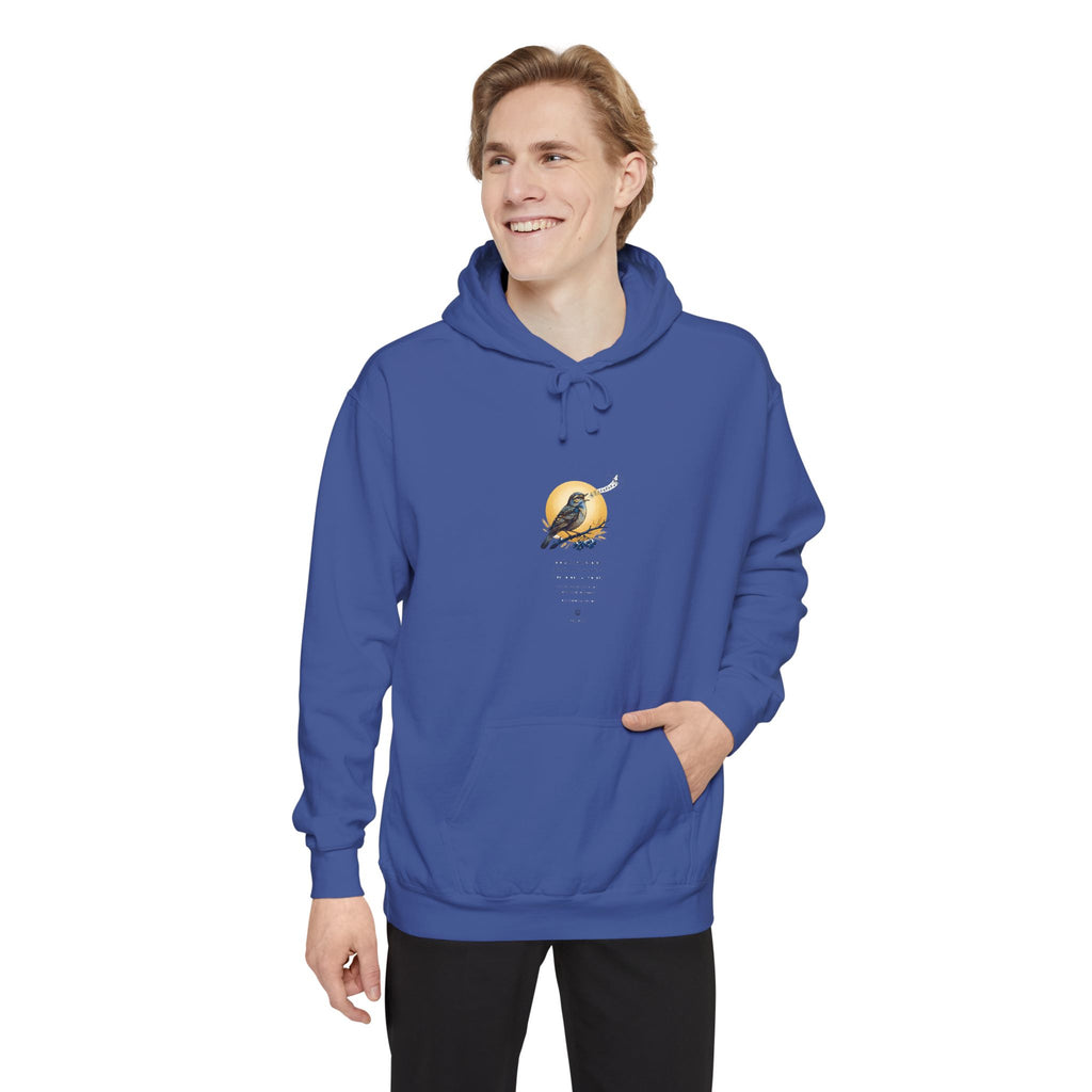 Man wearing the royal blue Chary Nochi hoodie by Palimpsest