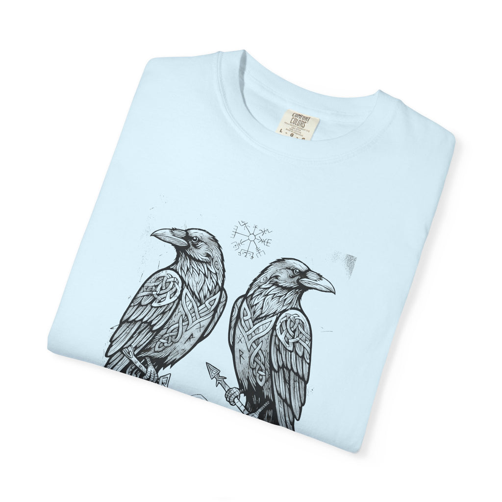 Folded pale blue Hávamál tee showing the woodcut raven print