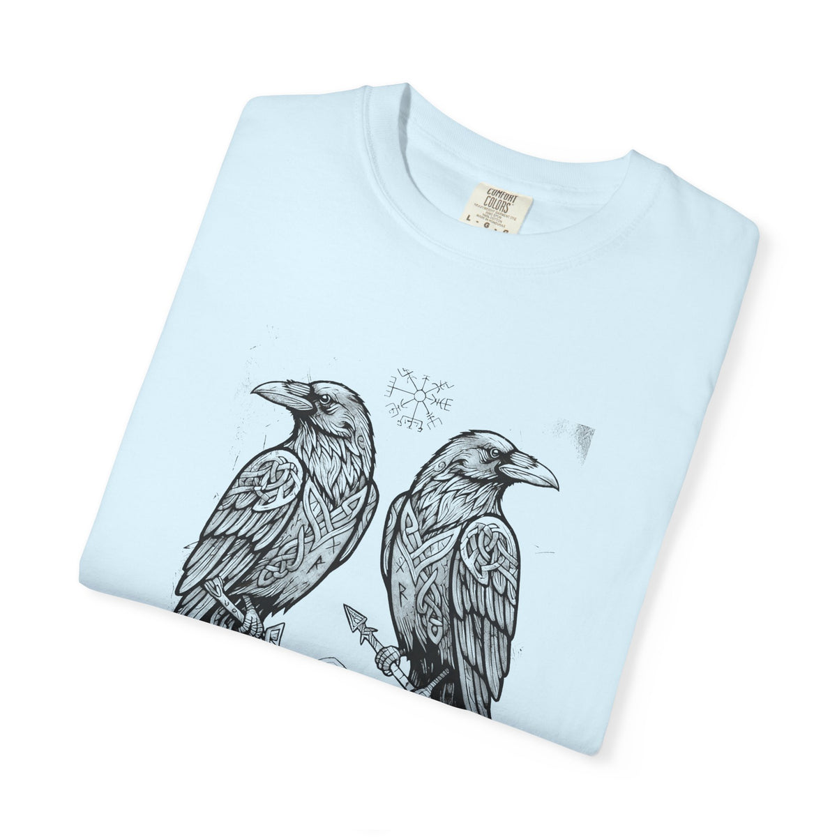 Folded pale blue Hávamál tee showing the woodcut raven print