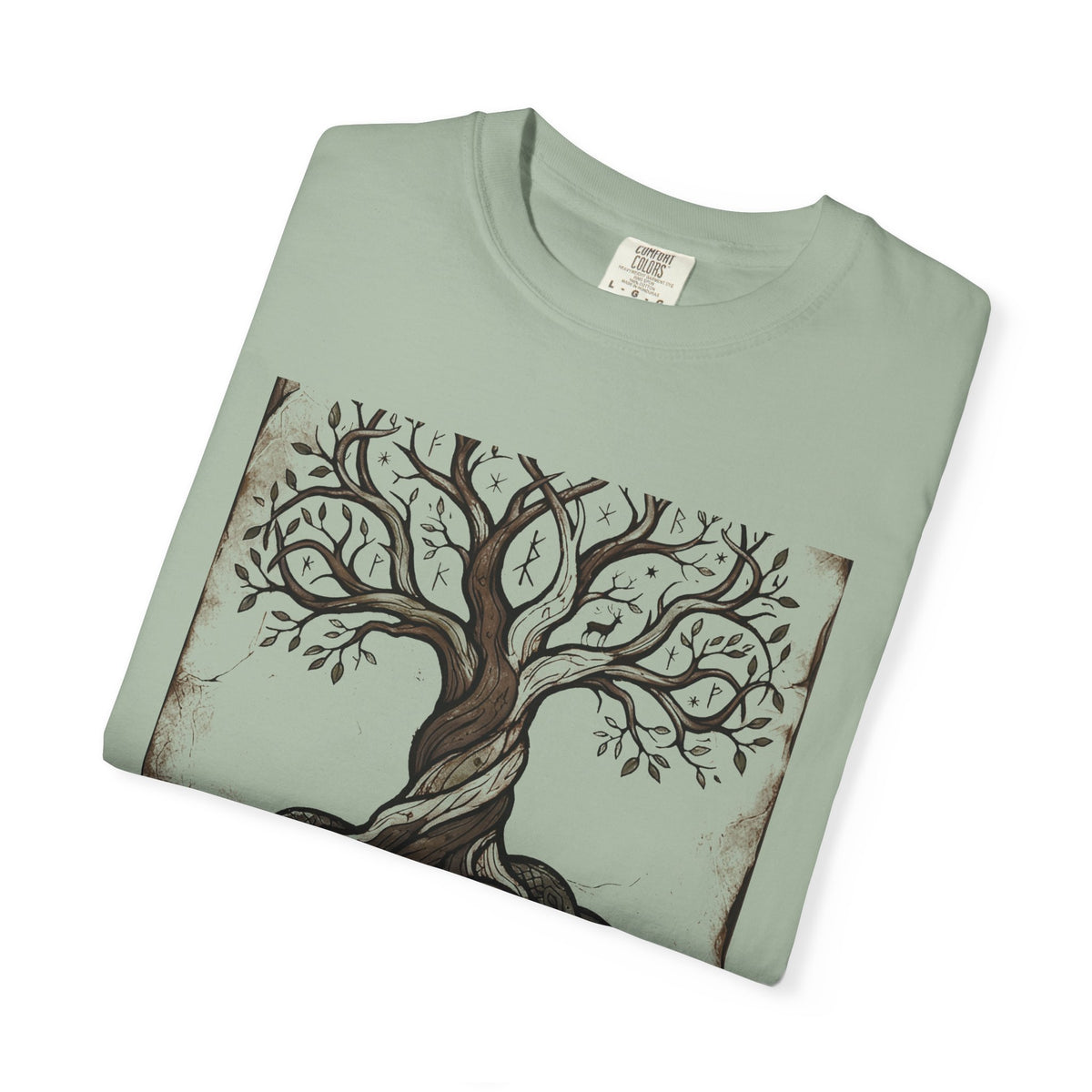 Folded sage green Völuspá tee showing the woodcut Yggdrasil print