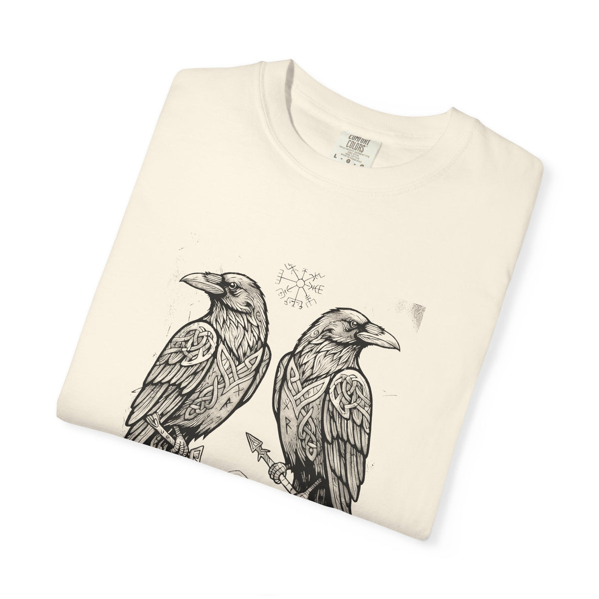 Folded ivory Hávamál tee showing the woodcut raven print
