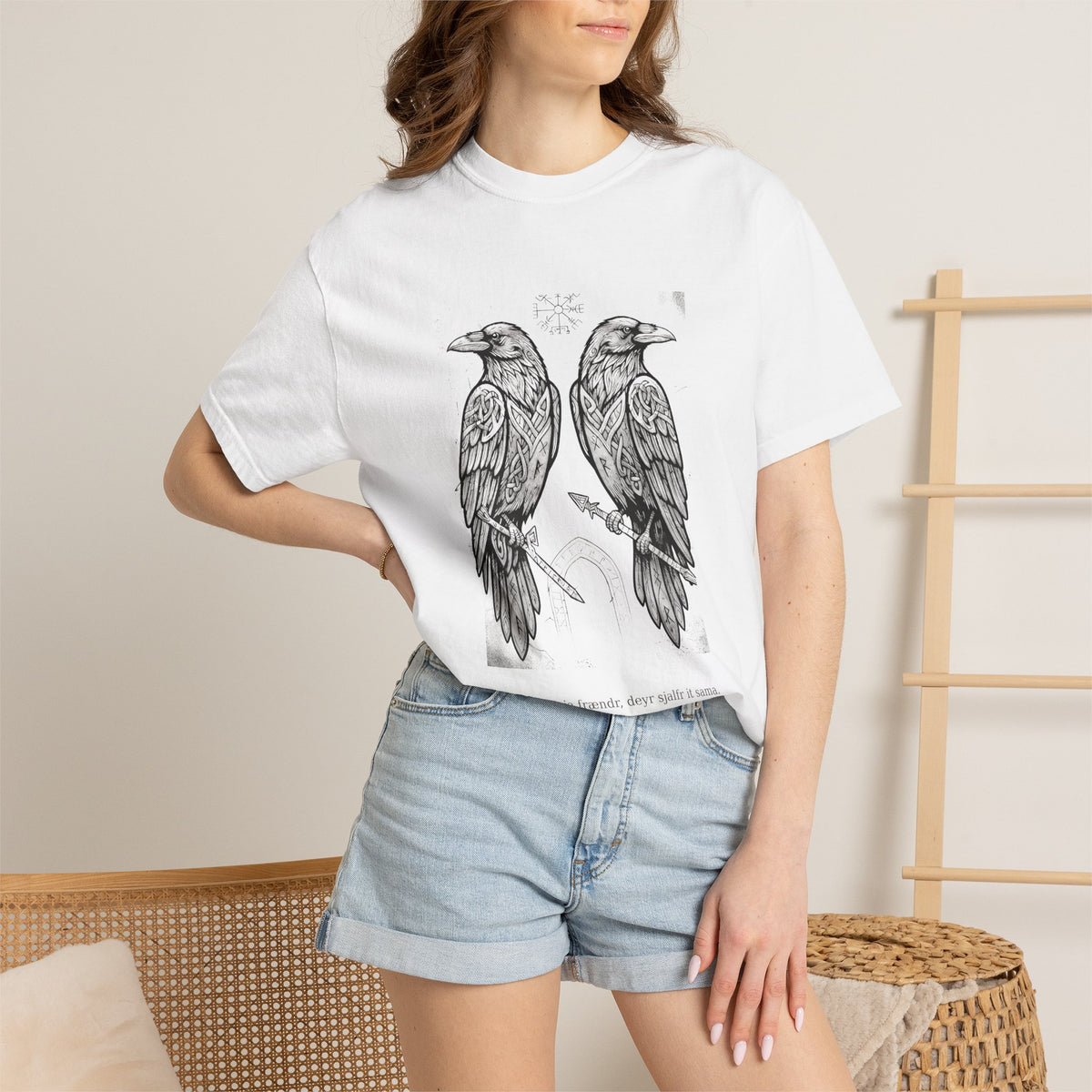 Model wearing the white Hávamál tee by Palimpsest