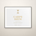 Carpe Diem gold typography print in a thin black frame with a white mat, hung on a warm plaster wall